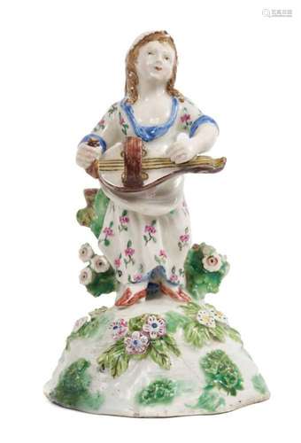 An unusual English porcelain figure of a young girl, circa 1...