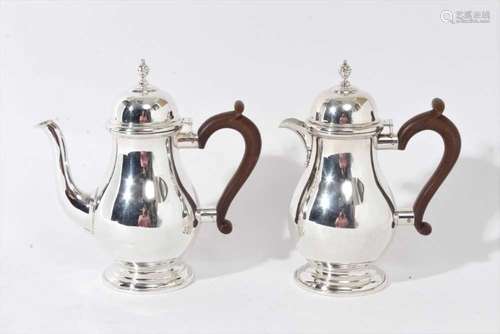 George III style silver coffee pot and hot milk jug of balus...