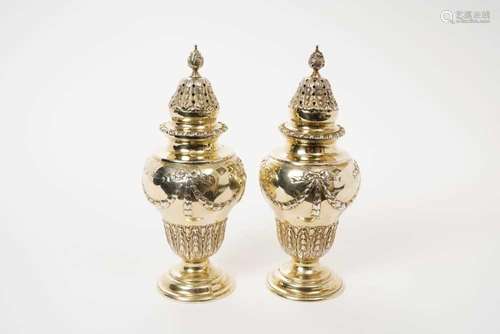 Late Victorian pair of silver gilt castors and covers, Londo...