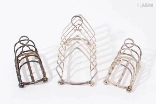 Pair 1920s small silver four division toast racks of hooped ...