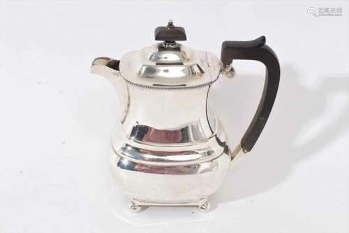 1930s silver coffee pot of shaped baluster form, with angula...