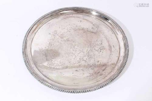 Late Victorian Mappin and Webb silver circular tray with gad...