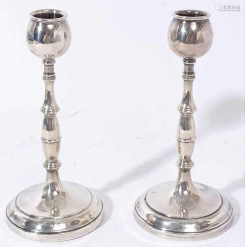 Pair silver candlesticks with ring decoration on circular ba...