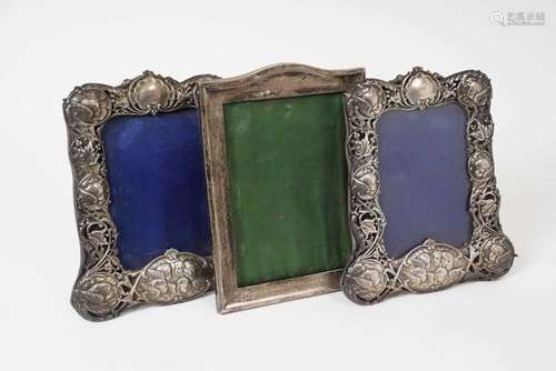 Pair of Victorian silver photo frames, together with another...