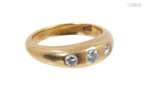 Diamond three stone ring in 18ct gold gypsy setting