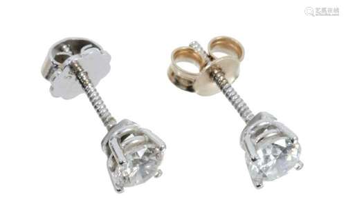 Pair of diamond single stone earrings