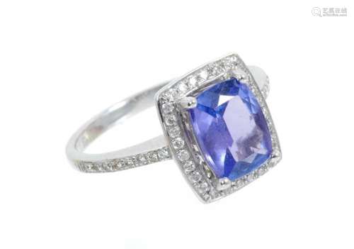 Tanzanite and diamond cluster ring with a cushion shape tanz...