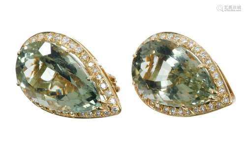 Pair of diamond and quartz ear clips, each with a large pair...