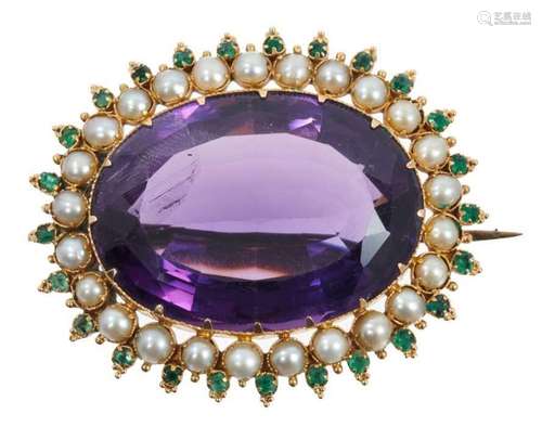 Victorian amethyst seed pearl and emerald brooch with a larg...