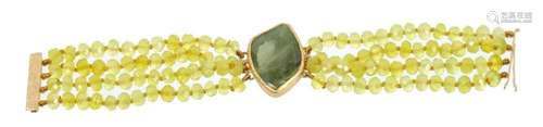 Gold and green stone four-strand bracelet with central green...