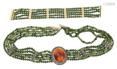 Unusual diamond, amber and green stone necklace with a centr...