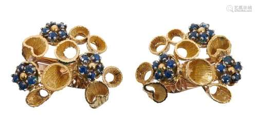 Pair of 1970s sapphire and gold earrings, each with three cl...