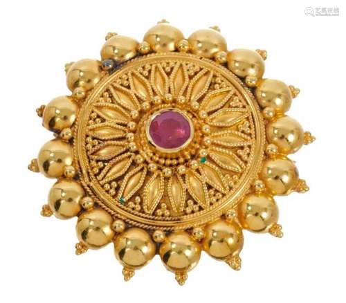 Indian gold starburst brooch with central ruby, stamped K22,...