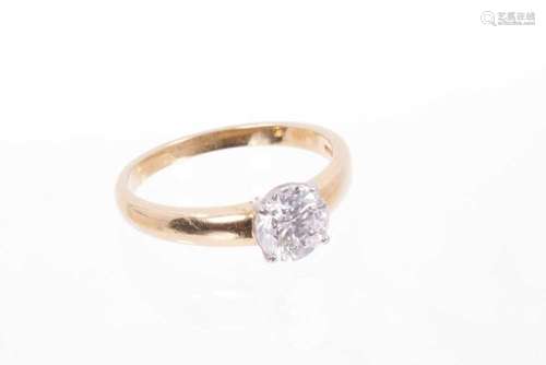 Fine diamond single stone ring with a round brilliant cut di...