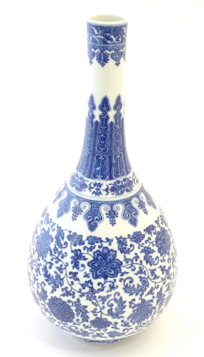 A Chinese blue and white bottle vase decorated with scrollin...