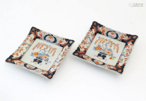 A pair of Japanese plates of square form decorated in the Im...