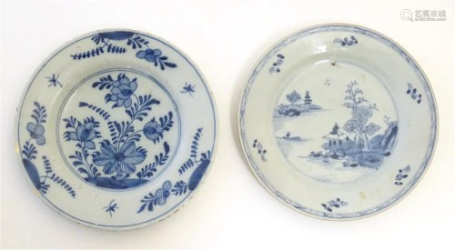 A Chinese blue and white plate decorated with stylised flowe...