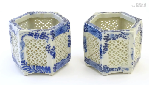 Two Chinese pot pourri holders of hexagonal form with blue a...