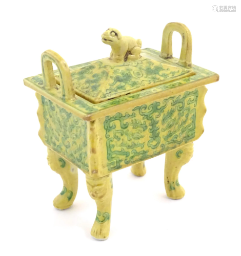 A Chinese rectangular censer with a yellow ground, raised on...