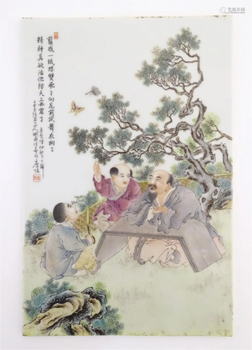 A Chinese porcelain plaque decorated with three seated male ...
