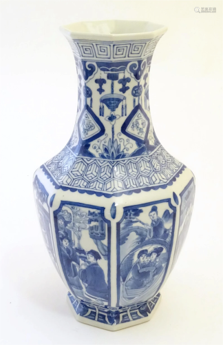 A Chinese blue and white vase of octagonal form with panelle...
