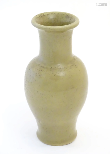 A Chinese stoneware baluster vase with a crackle glaze. Appr...