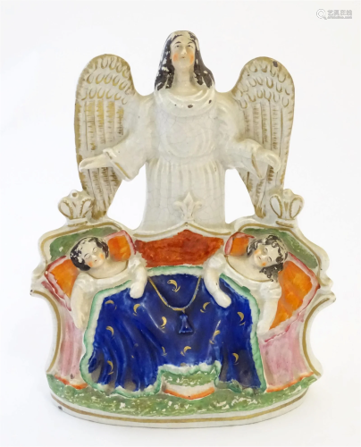 A Victorian Staffordshire pottery flat back figural group de...