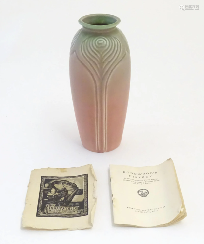 An Art Nouveau Rookwood Pottery vase with stylised foliate d...
