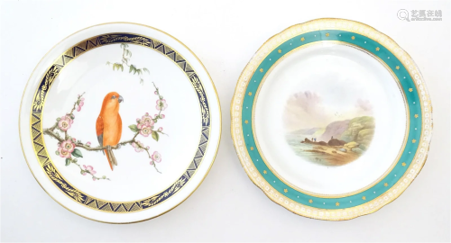 A 20thC hand painted plate decorated with a bird perched on ...