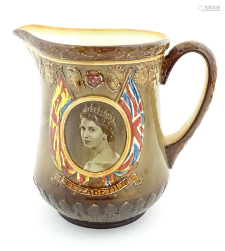 A Royal Doulton jug commemorating the Coronation of Queen El...