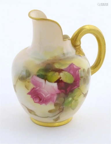 A Royal Worcester flatback jug with a shaped spout, with pai...