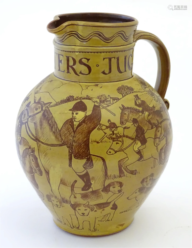 A terracotta hunting jug decorated with a hunting scene, &#x...