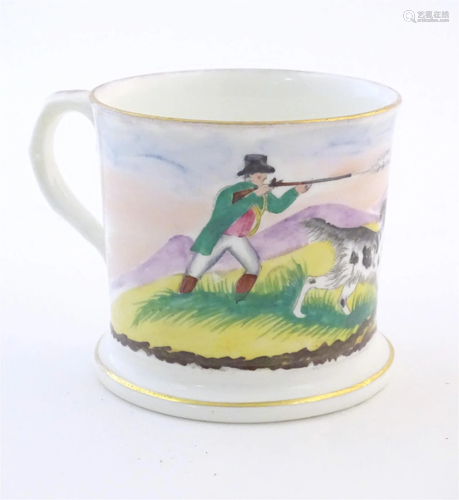 A Staffordshire mug decorated with a landscape scene depicti...