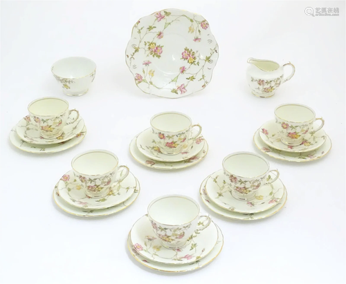 A quantity of Sutherland China tea wares decorated with pink...