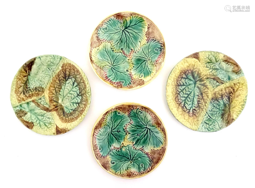 Four Victorian majolica leaf plates of circular form two wit...