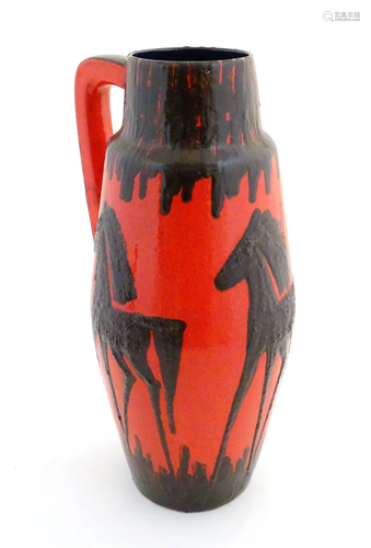 A West German Scheurich vase with single handle with horse d...