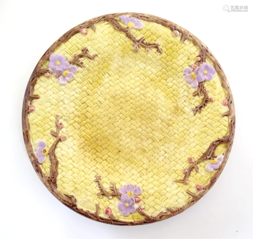 A Victorian majolica Joseph Holdcroft plate of circular form...