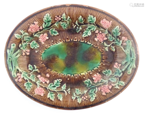 A majolica oval serving dish in the manner of Wedgwood with ...