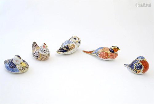 Five Royal Crown Derby paperweights modelled as birds compri...