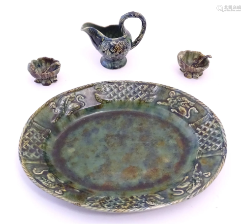 A quantity of Continental wares with a mottled green glaze c...