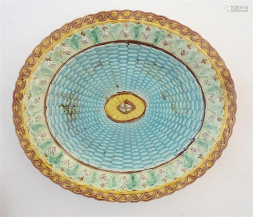 A Wedgwood majolica oval serving dish with banded fruiting v...