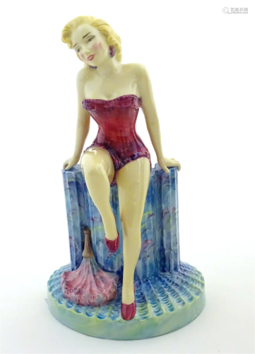 A limited edition figure modelled as Marilyn Monroe by Kevin...
