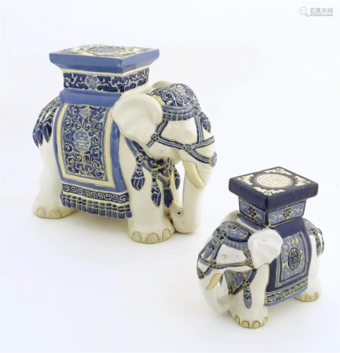 Two Chinese blue and white jardiniere / pot stands modelled ...