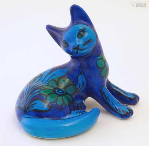 A 20thC Italian model of a seated cat by Bellini with blue f...