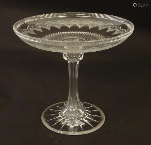 A 19thC glass comport / tazza with cut decoration. 9" d...