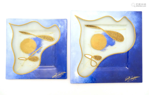 Two studio glass plates of squared form with gilt abstract d...