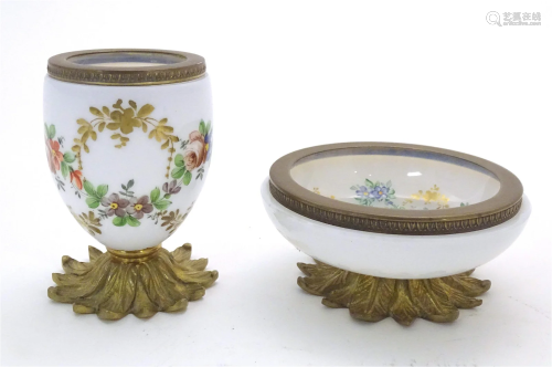 A French white glass bowl with hand painted floral detail an...
