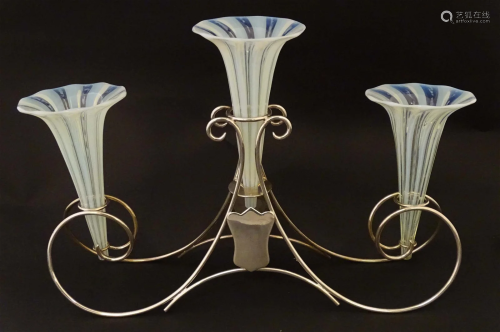 A 20thC silver plate table epergne with three Vaseline glass...