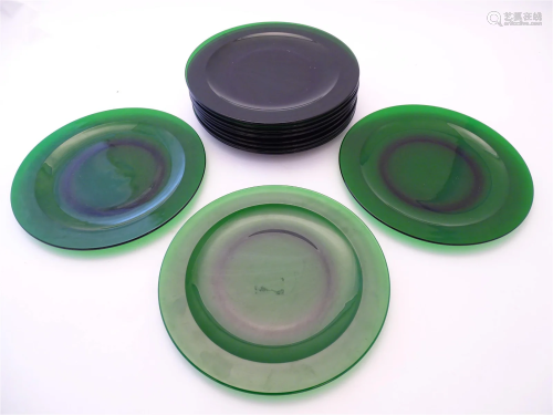 12 green glass plates. Approx 11 3/4" diameter (12)