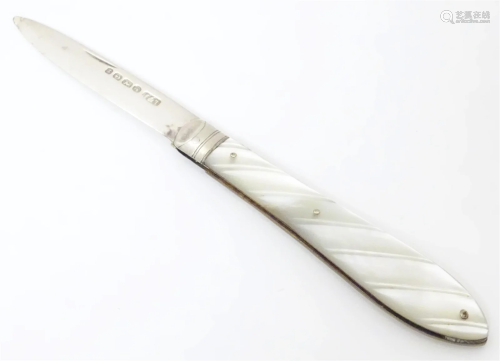 A Victorian silver folding fruit knife with mother of pearl ...